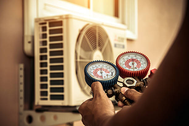 Professional Heat Pump Repair technician working in Chester, IL